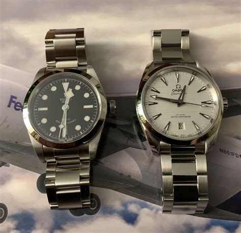 Black Bay 36 VS Omega Aqua Terra 38 .